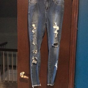 Ripped front ankle jeans